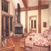 log home bedroom with fireplace